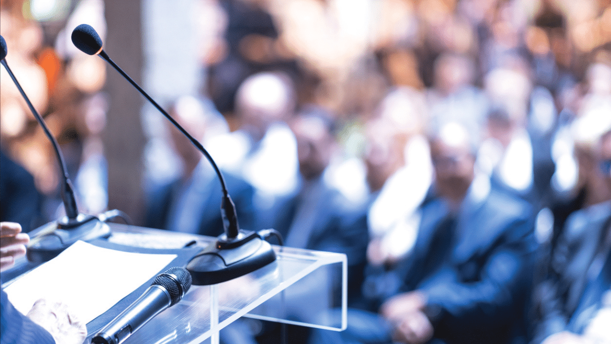 a stock photo of a speaker podium at a conference