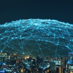 stock photo of a city with a connected web of lights over the city in a dome shape – signifying IoT security